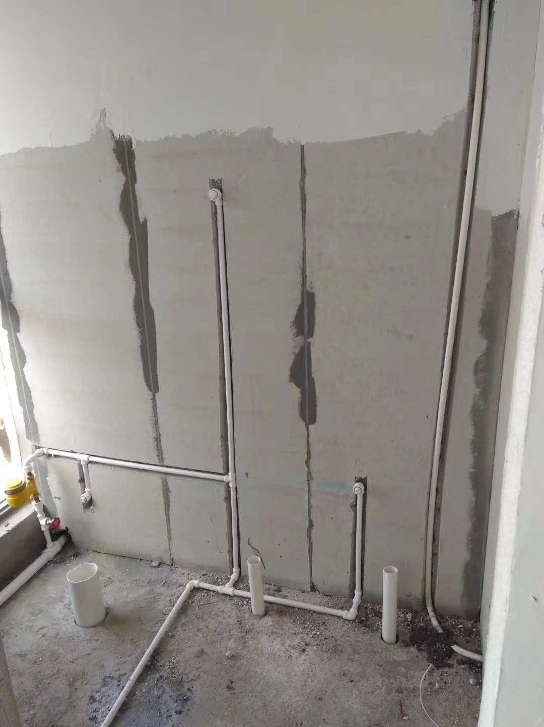 Wall-panel routing and pipe installation